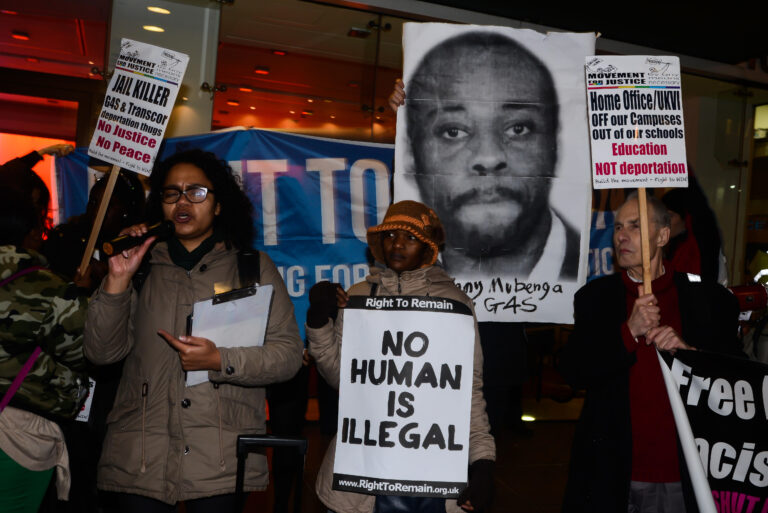 London,UK, 18th December 2014 : A large group of protesters march from the Home Office protests outside G4S HQ demands Justice for Jimmy Mubenga killed by G4S security officers in London. Credit:  See Li/Alamy Live News
