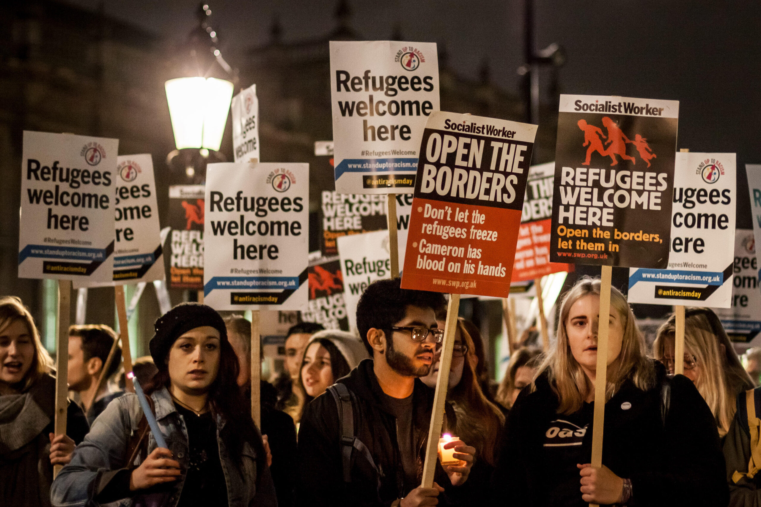 London, UK. 12th November, 2015. ?Refugees Welcome Here? protest and vigil opposite Downing Street Credit:  Guy Corbishley/Alamy Live News
