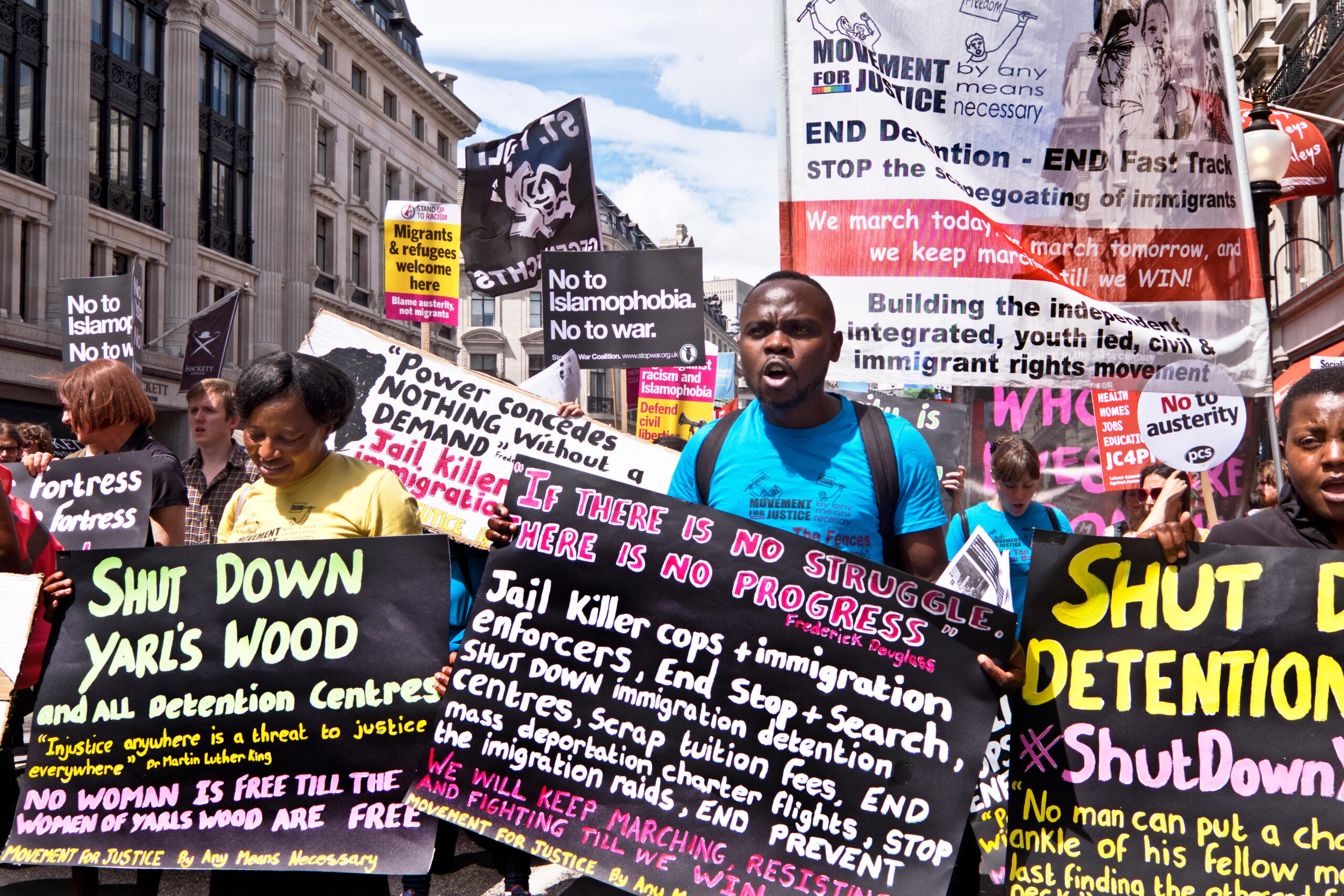 Shut down Refugee detention Centres. Movement for Justice by any means necessary. Protest in London against racism and Tory au