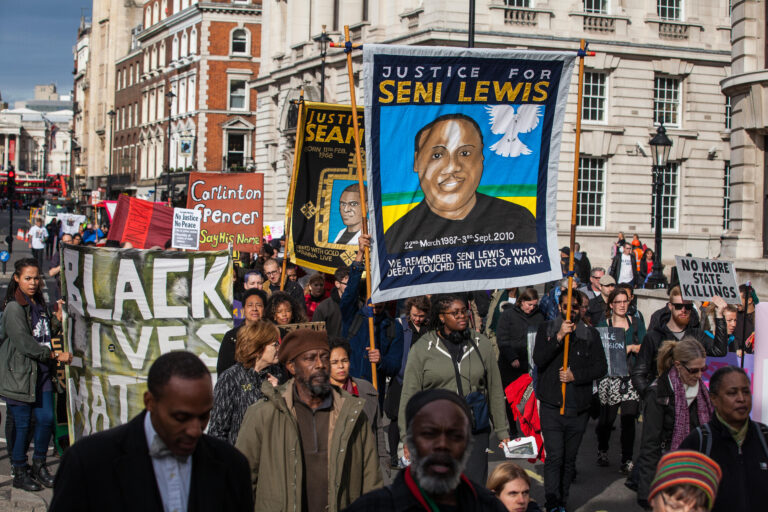 London, UK. 28th October, 2017. Campaigners from the United Families and Friends Campaign (UFFC) take part in their annual procession in remembrance of family members and friends who died in police custody, prison, immigration detention or secure psychiat
